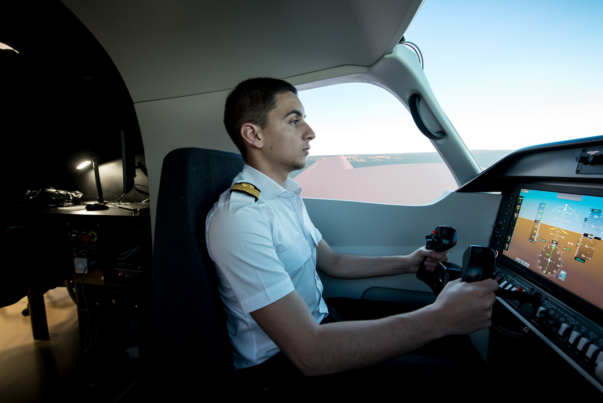 A pilot in Alsim Al250 flight simulator